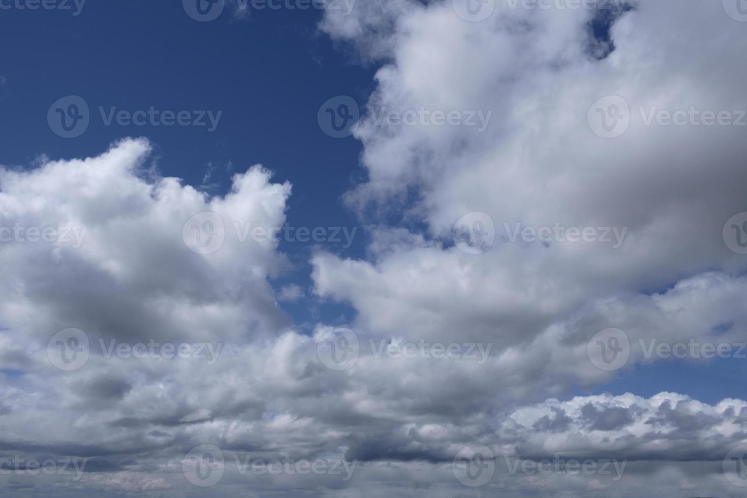 the boundless expanse of the sky with cumulus clouds and rays of the sun, moments of daybreak and sunset photo