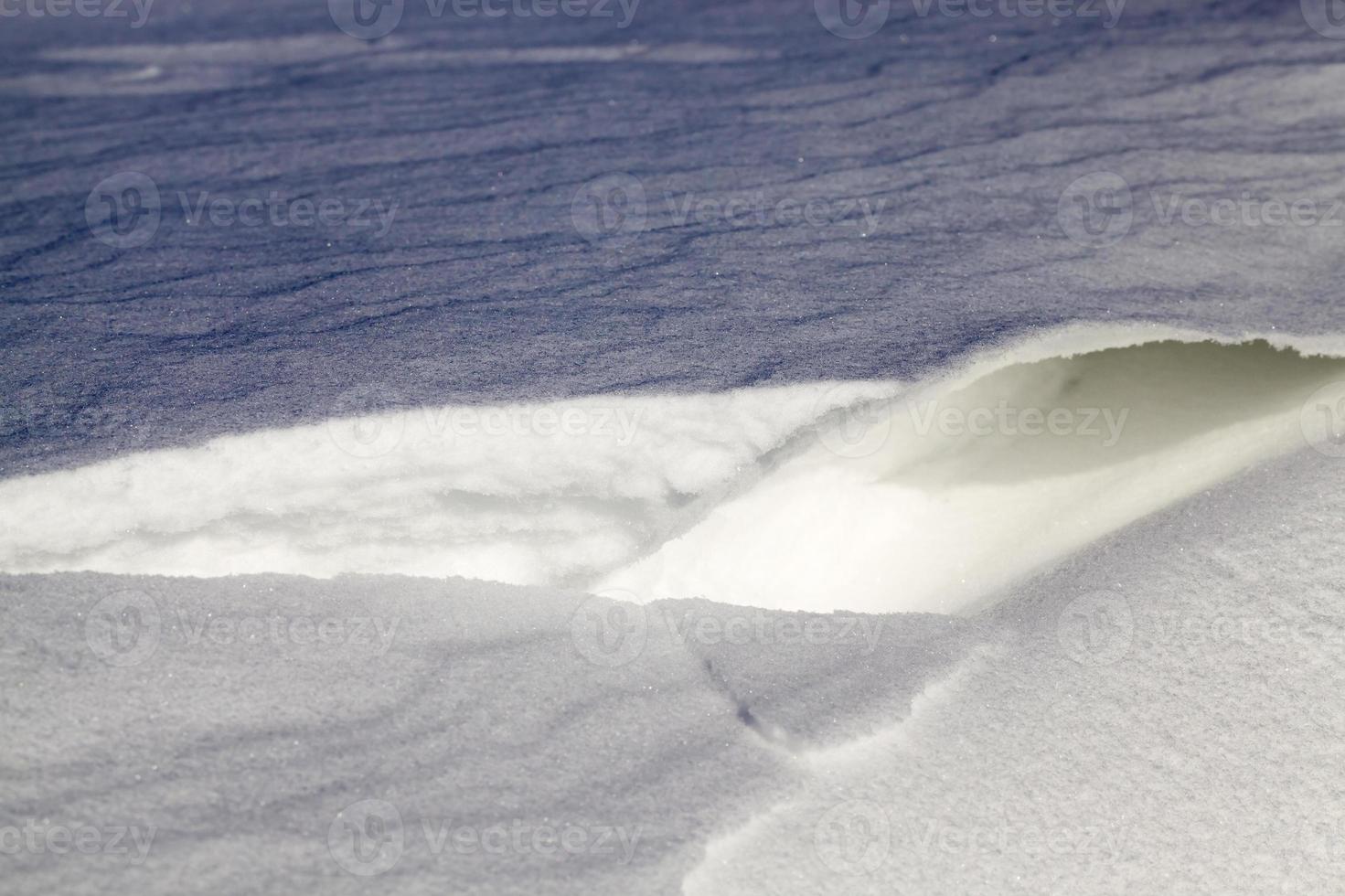 sunlight illuminating snow photo