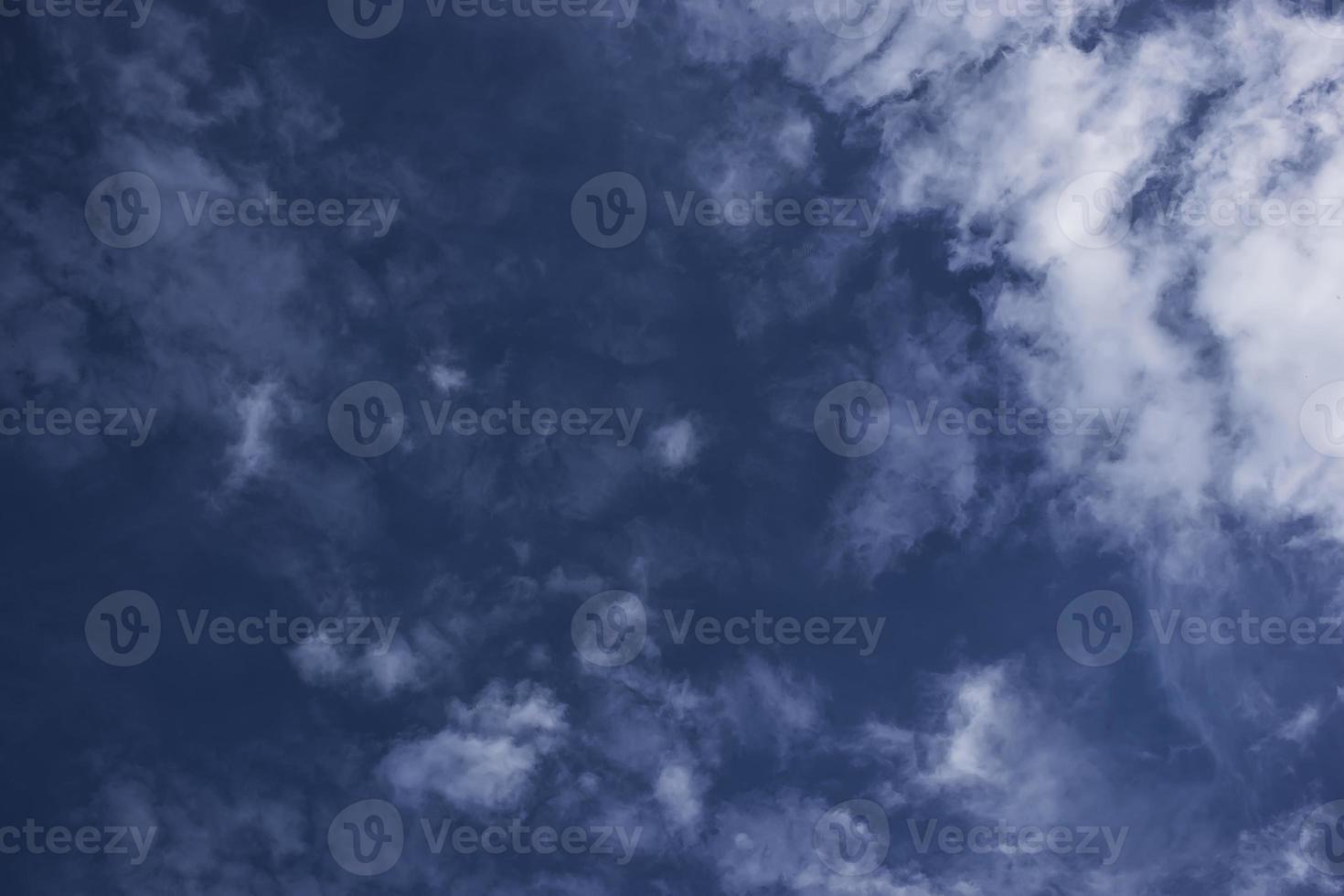boundless expanse of the sky with cumulus clouds and rays of the sun, moments of daybreak and sunset photo