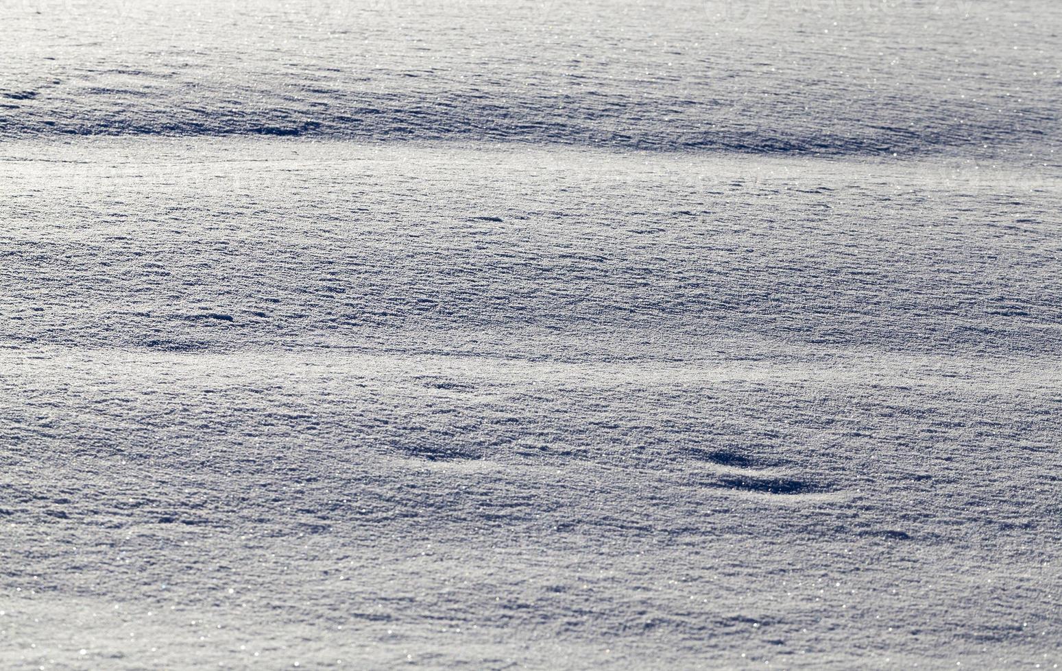 Snow drifts in winter photo