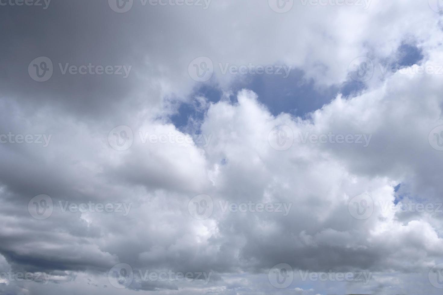 the boundless expanse of the sky with cumulus clouds and rays of the sun, moments of daybreak and sunset photo