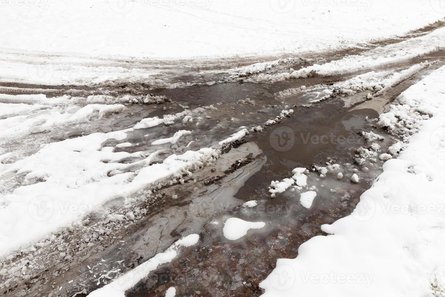 traces of the car on snow photo
