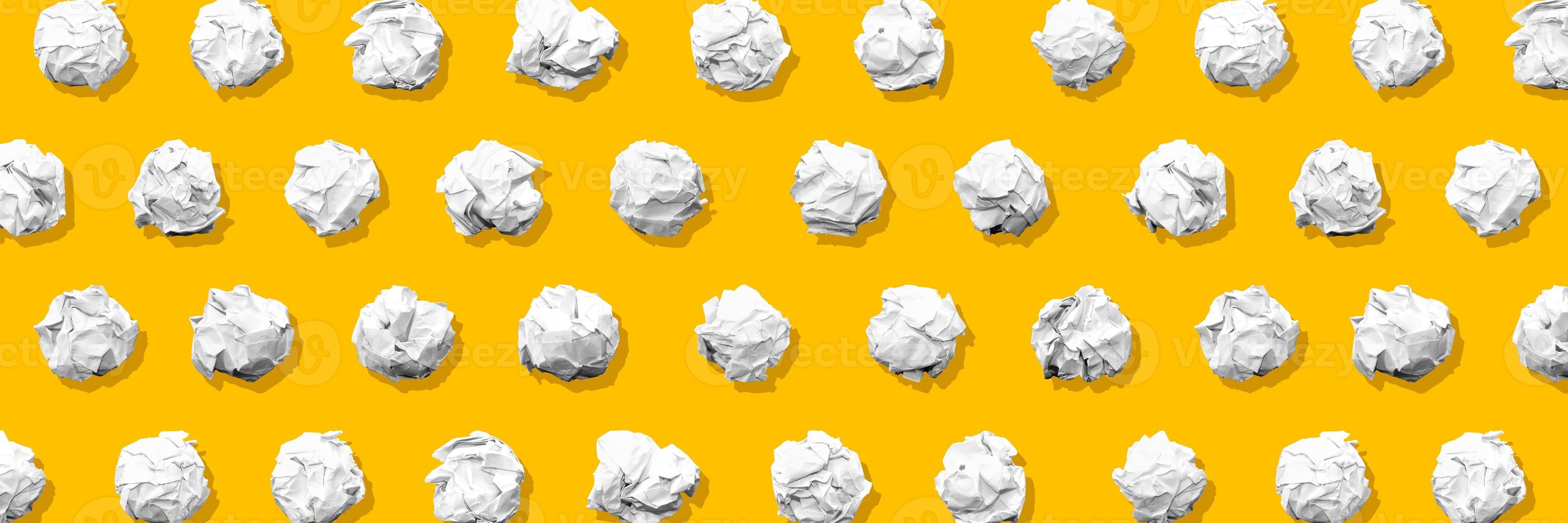 Crumpled paper balls for background pattern. Isolated and neatly organized for cover, ad, and others photo