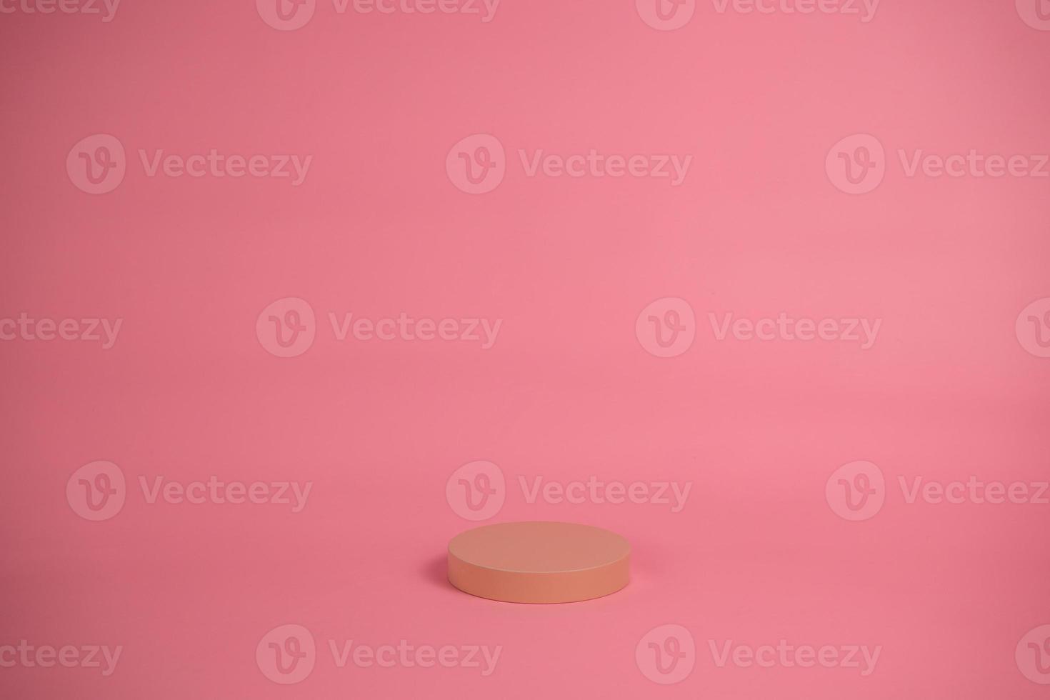 Empty podium for display cosmetic product. Platform arrangement in pink pastel color in trendy minimalist style. Composition of cylinders and cubes layout for feminine background photo