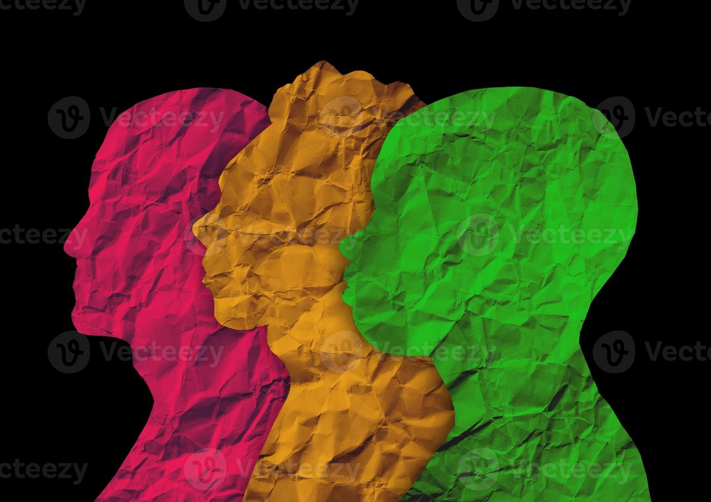 Human head silhouette with black background. People portrait with crumpled paper texture. Cut out paper people from side angle. the concept background of unity in diversity photo