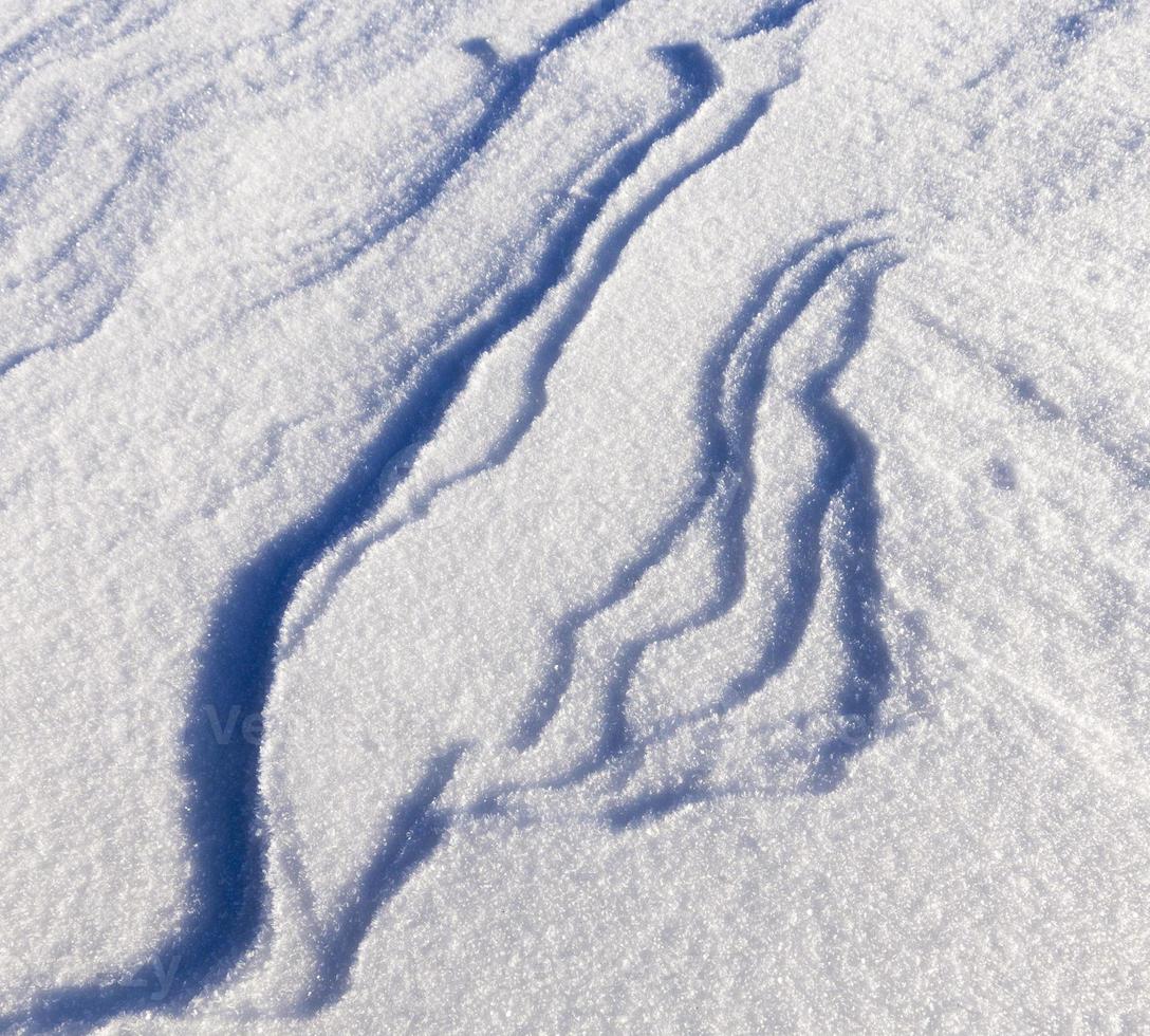 Snow drifts in winter photo