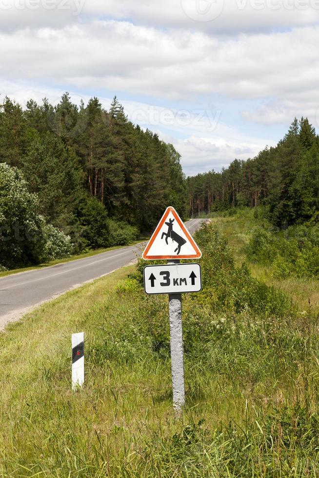 old and dirty road sign photo
