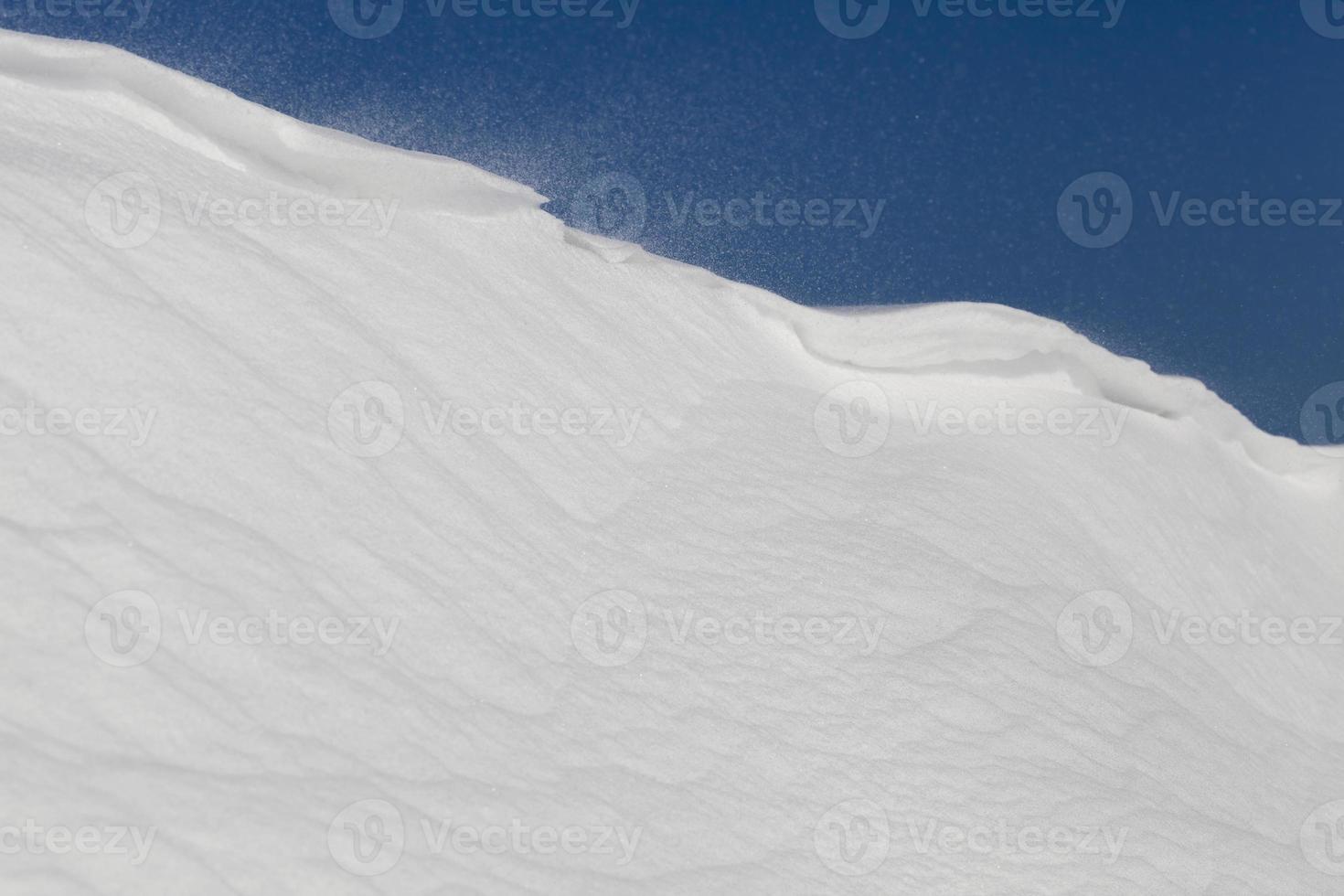 white uneven snowdrift photo