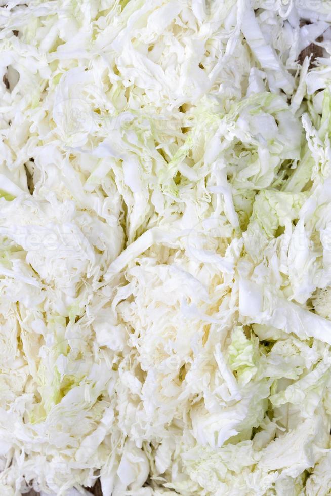 white cabbage cut into pieces photo