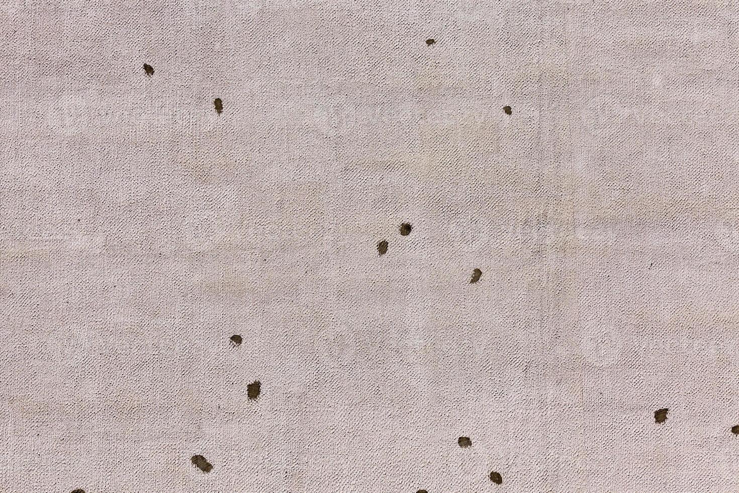 the wall of a house with traces of repair photo