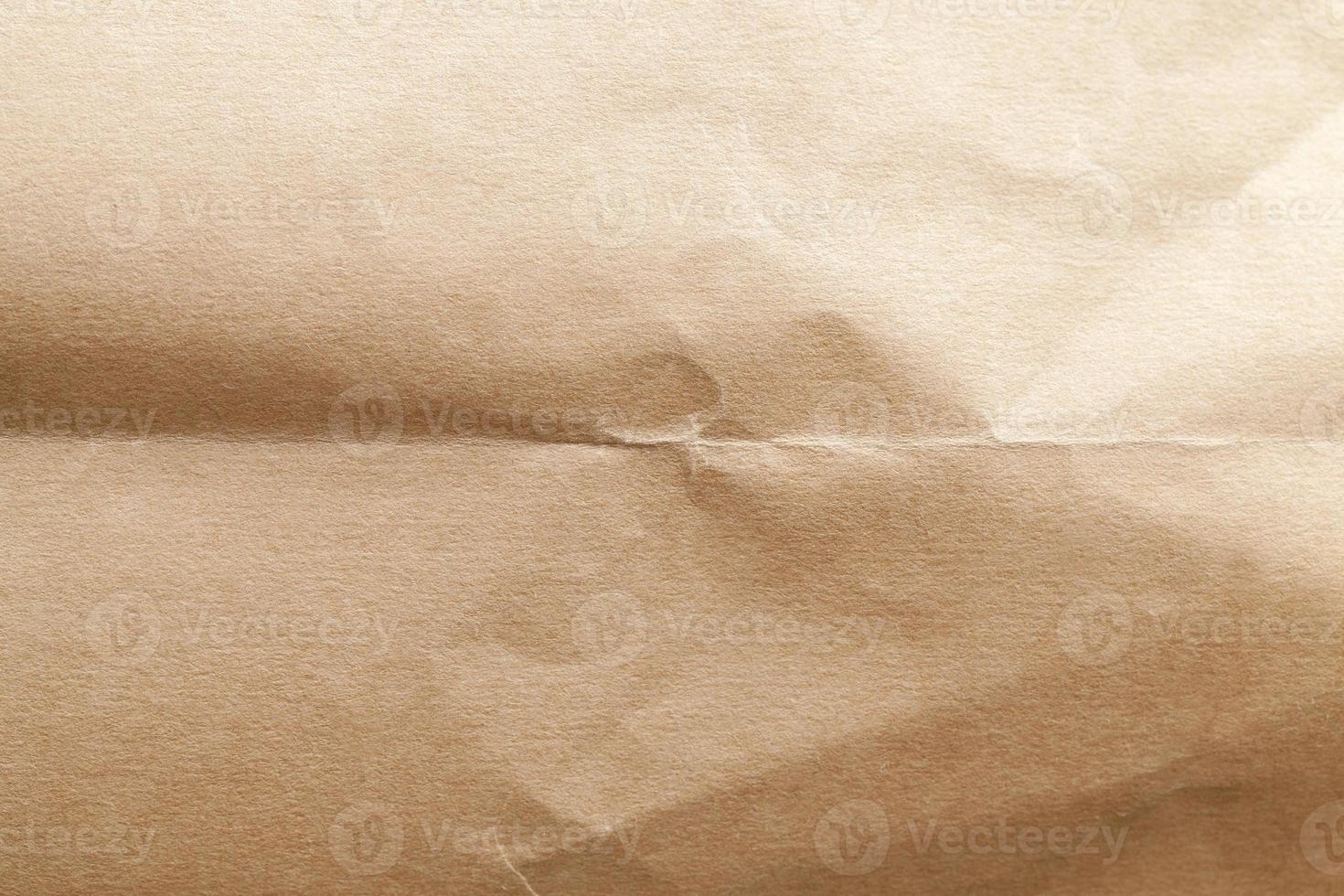 crumpled yellow paper made from recycled paper photo