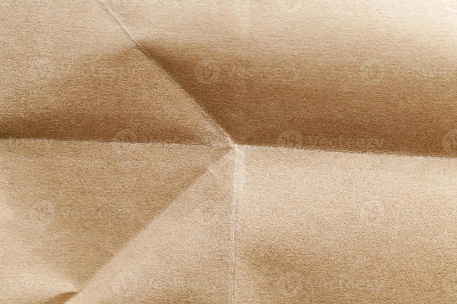 crumpled yellow paper made from recycled paper photo
