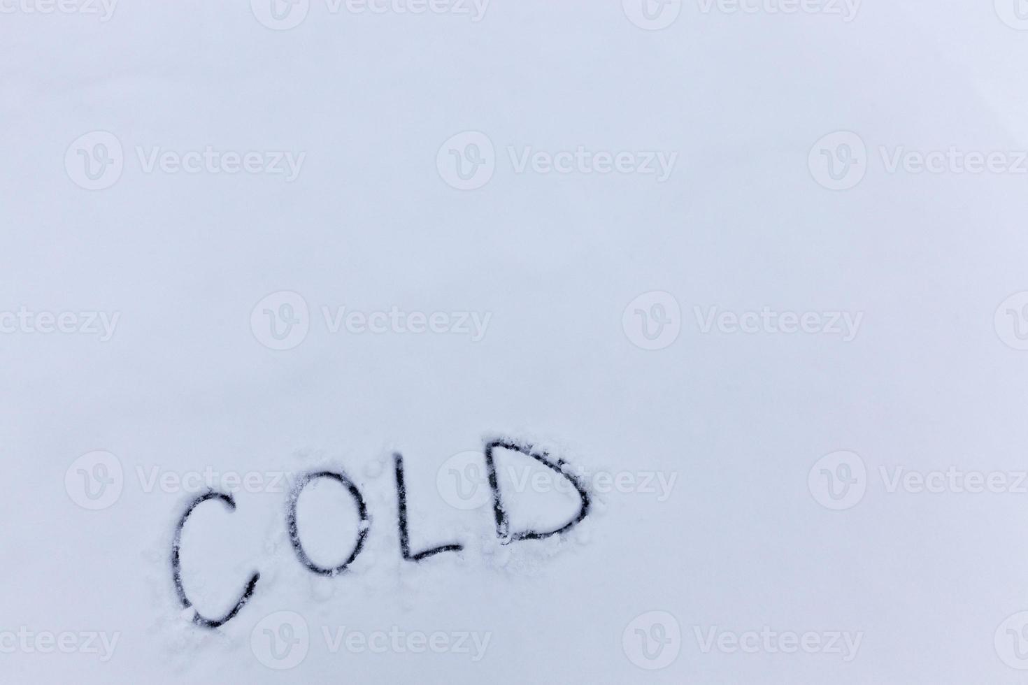 drawn on the snow, temperature symbols denoting negative very cold weather photo