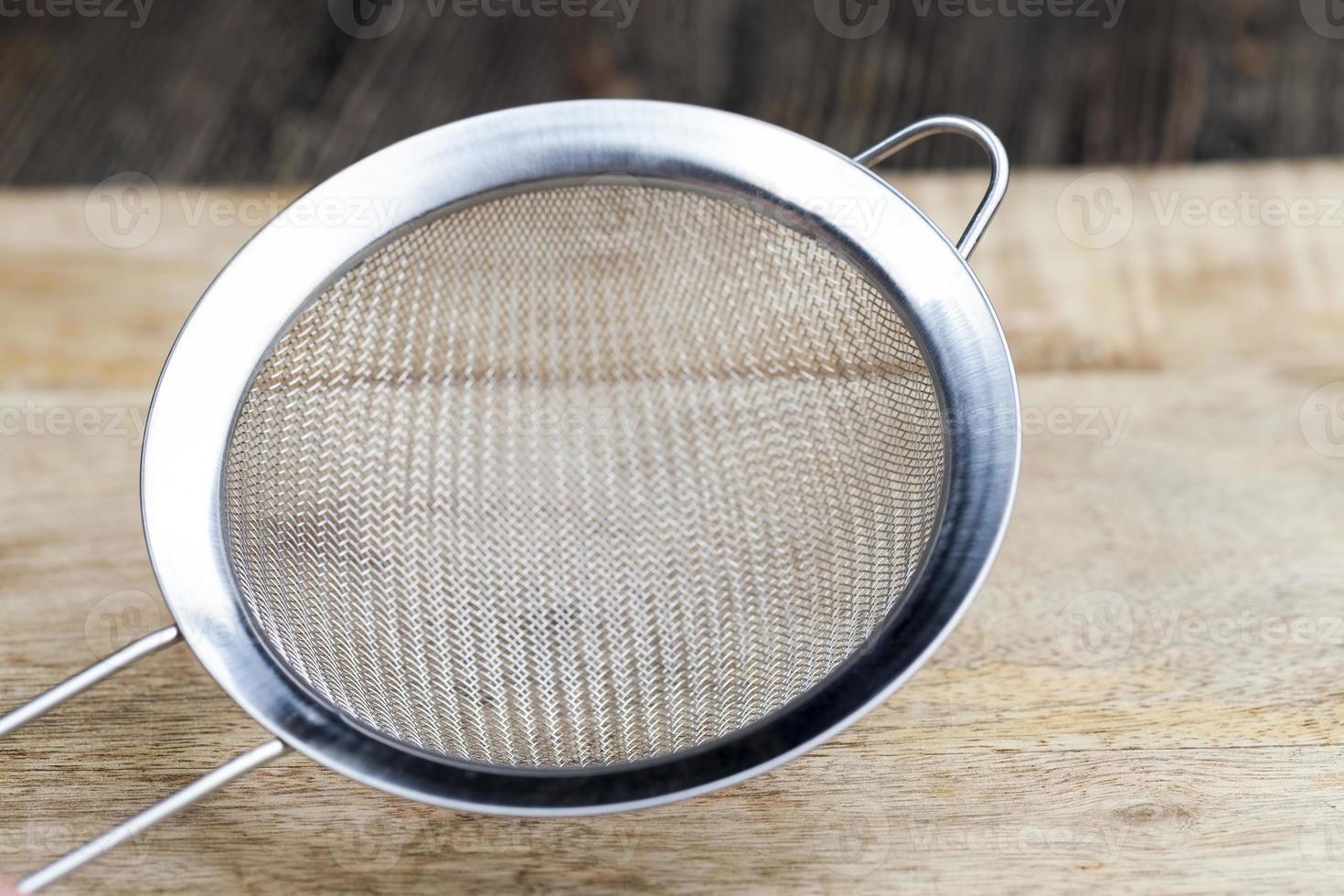 metal sieve with small cells photo