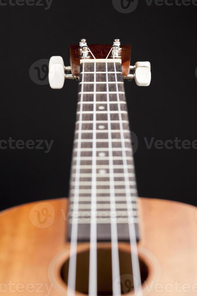 made of mahogany small guitar photo