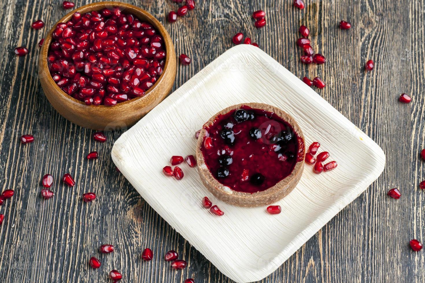 fruit and berry cake tartlet with cream photo