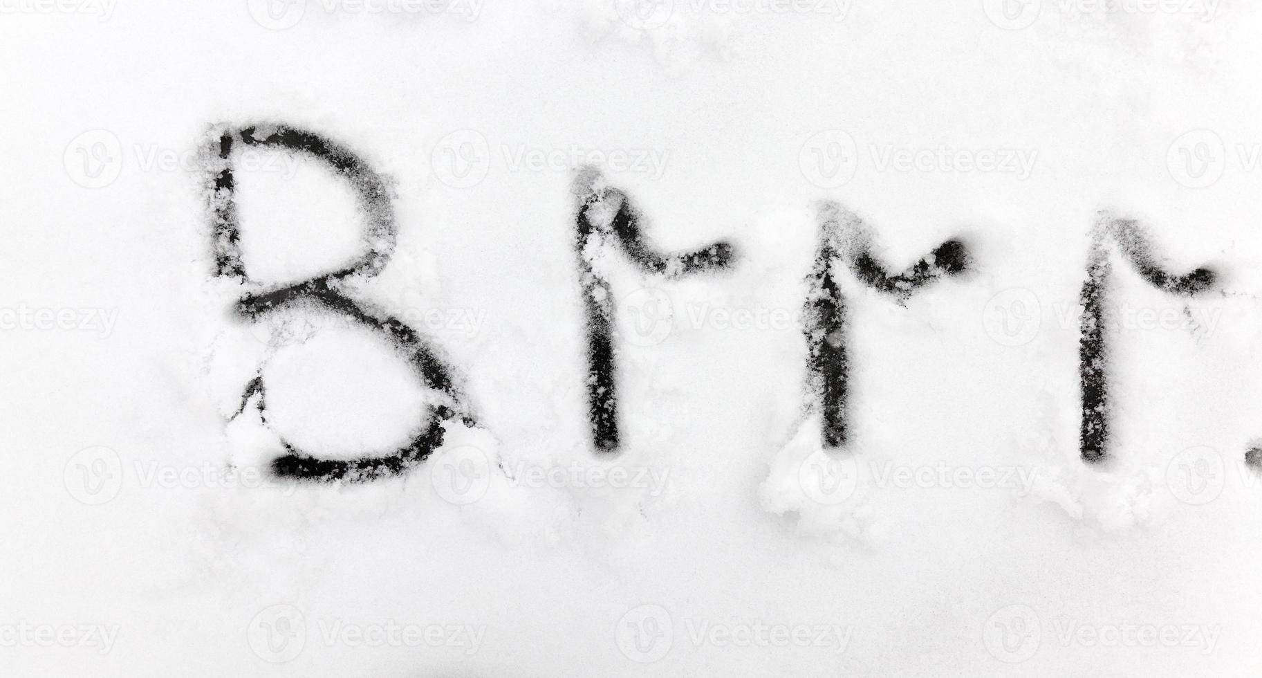 drawn on the snow, temperature symbols denoting negative very cold weather photo