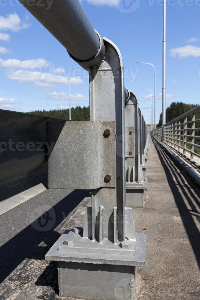 steel fences on the road to ensure the safety of cars photo