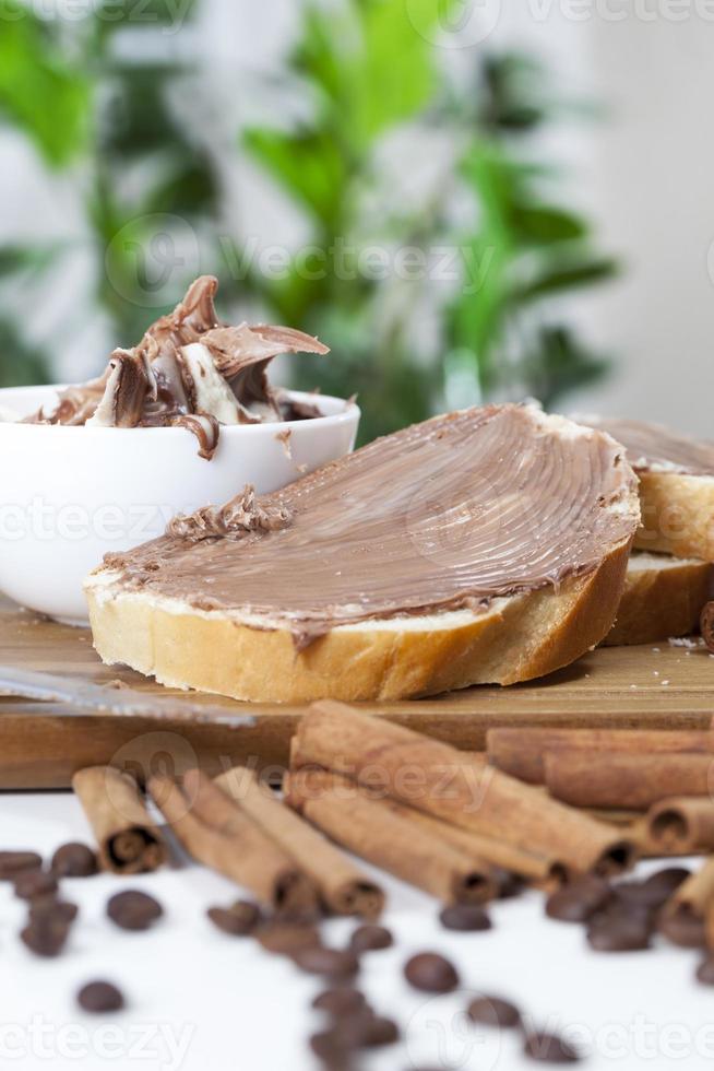 soft chocolate butter and white baguette, natural cocoa chocolate photo