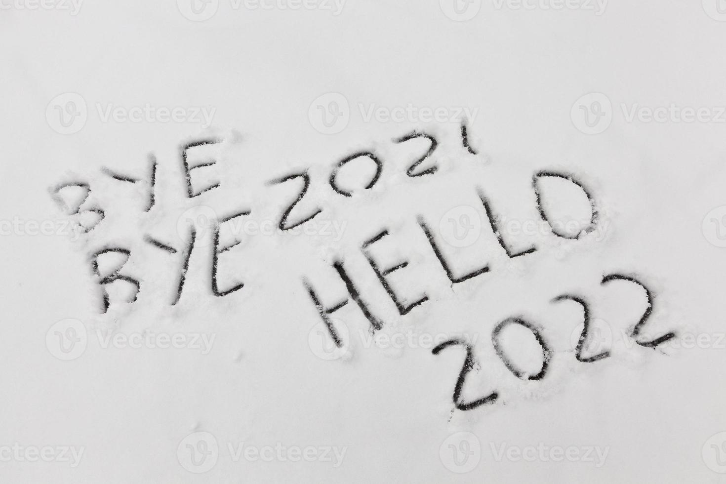 painted on the snow inscriptions associated with the coming of the new year photo