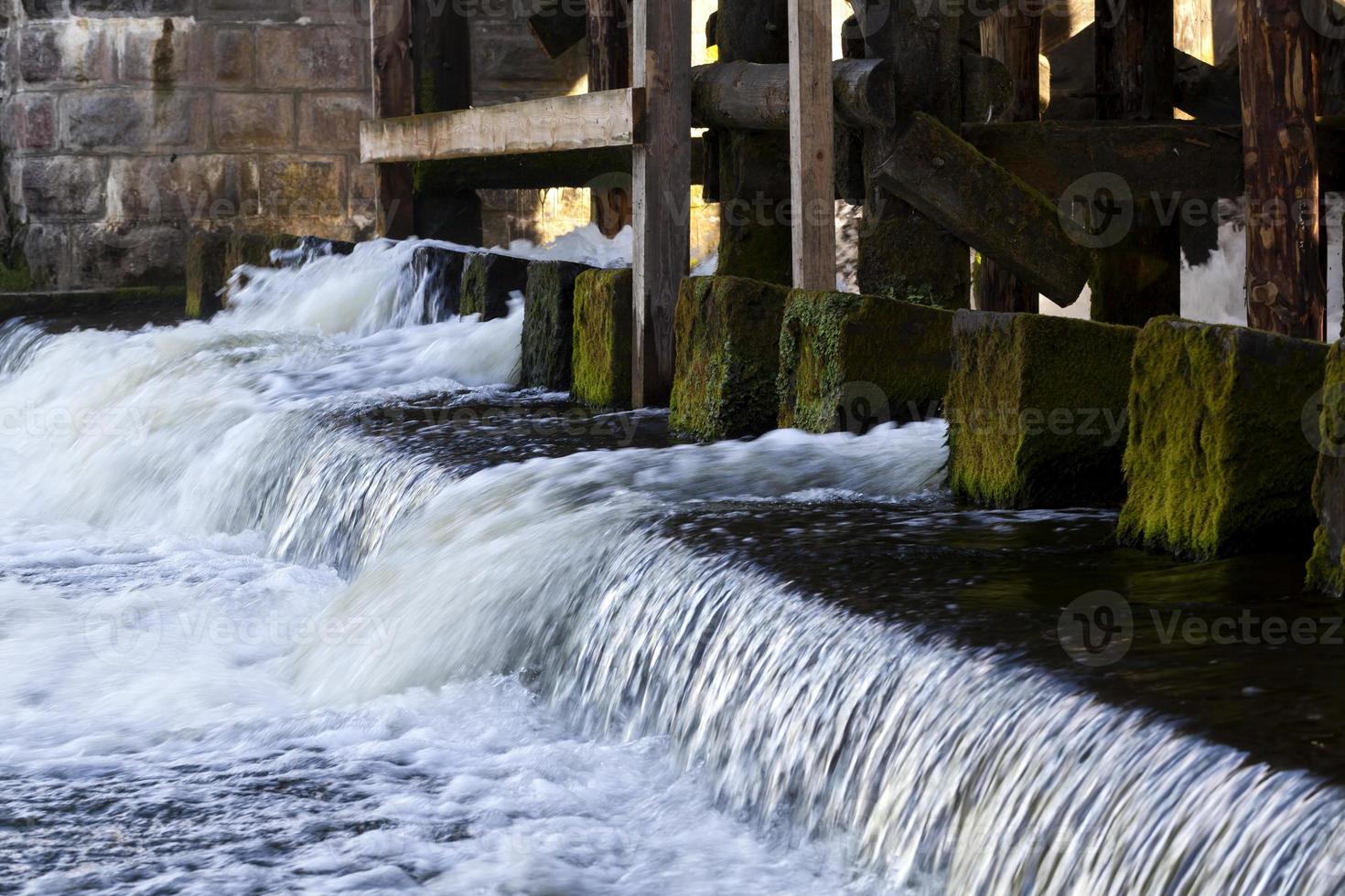 the lower part of a small dam photo