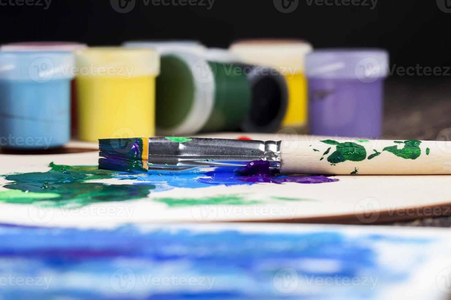 creative process of drawing by mixing different colors photo