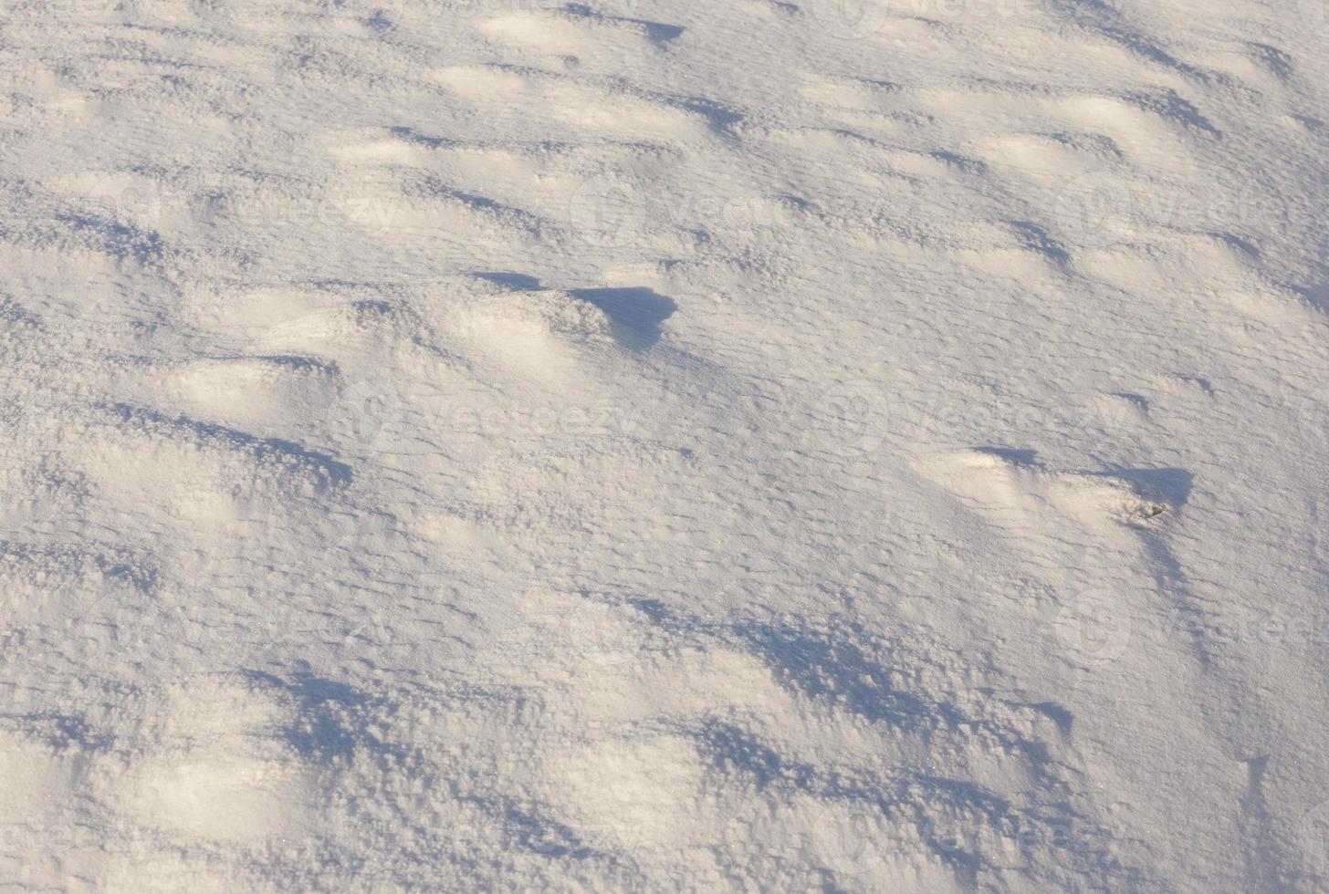 Snow drifts in winter photo