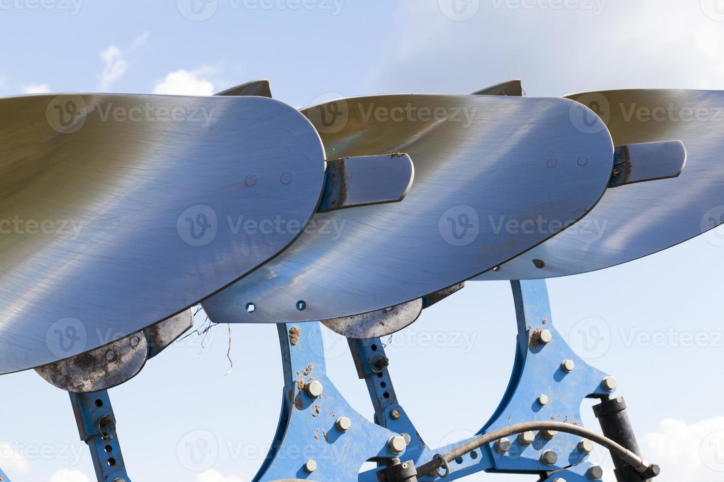 polished steel plows photo