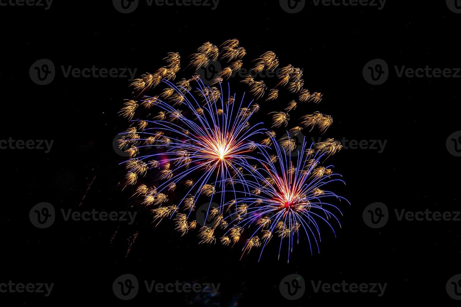 fireworks celebration in the dark background photo