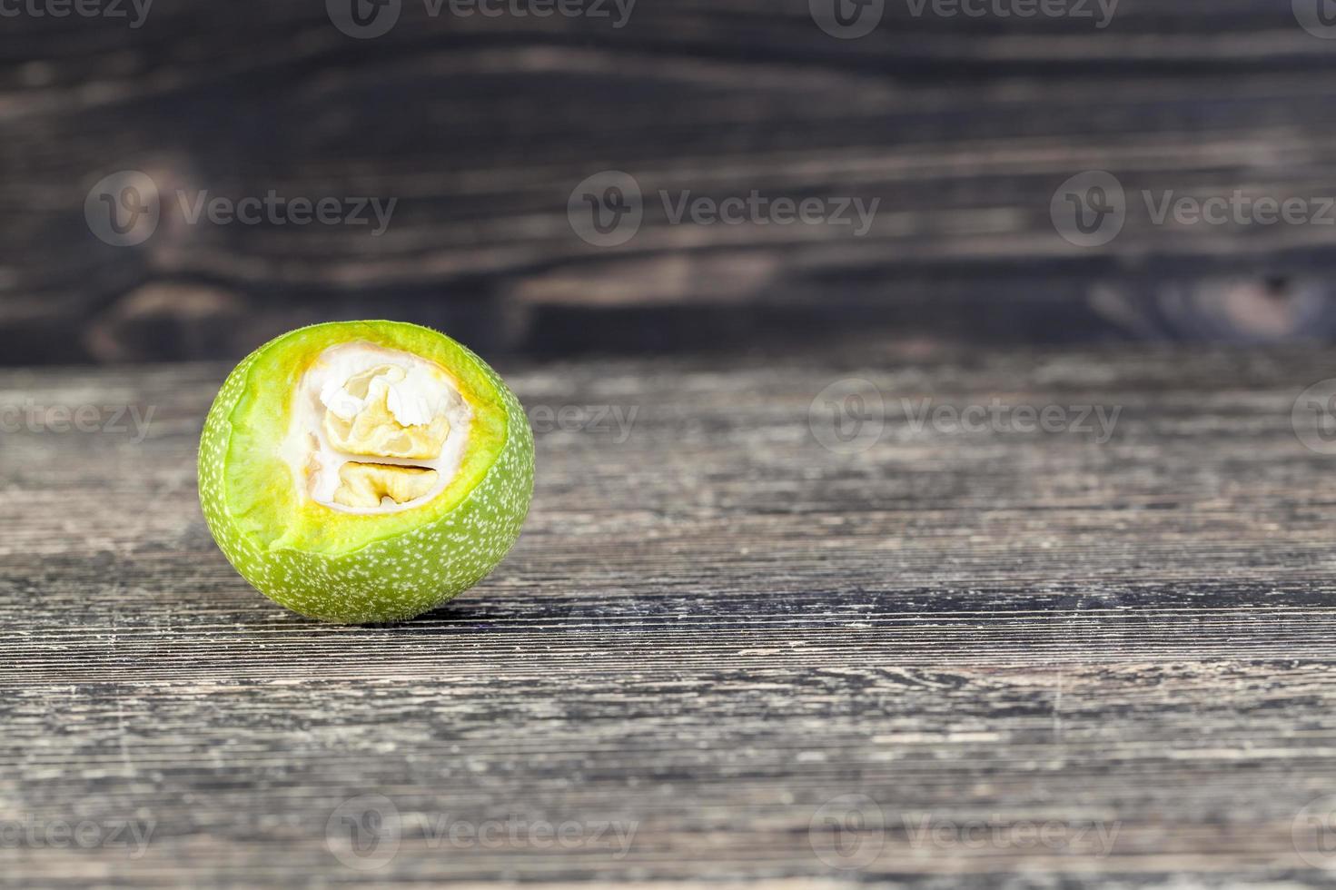 cut green walnut photo