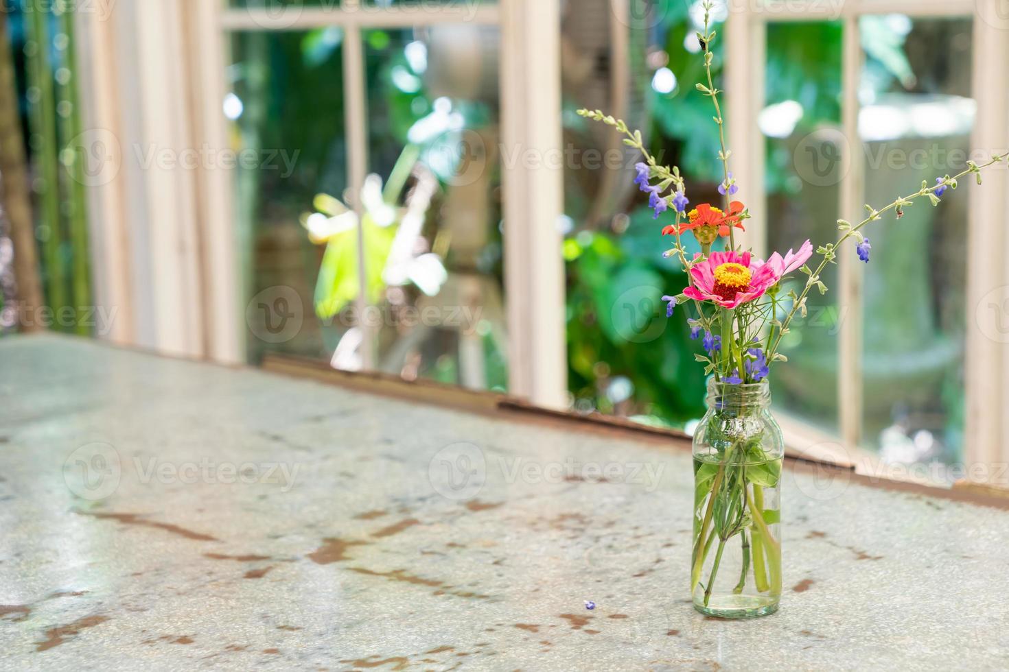beautiful flower in vase decorated on table photo