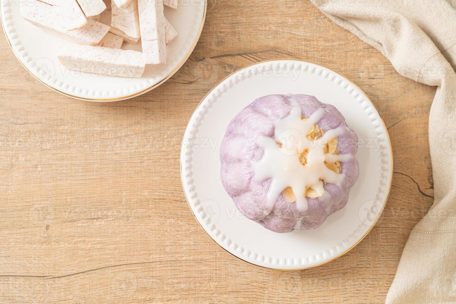 taro bun with white sugar cream and nut photo