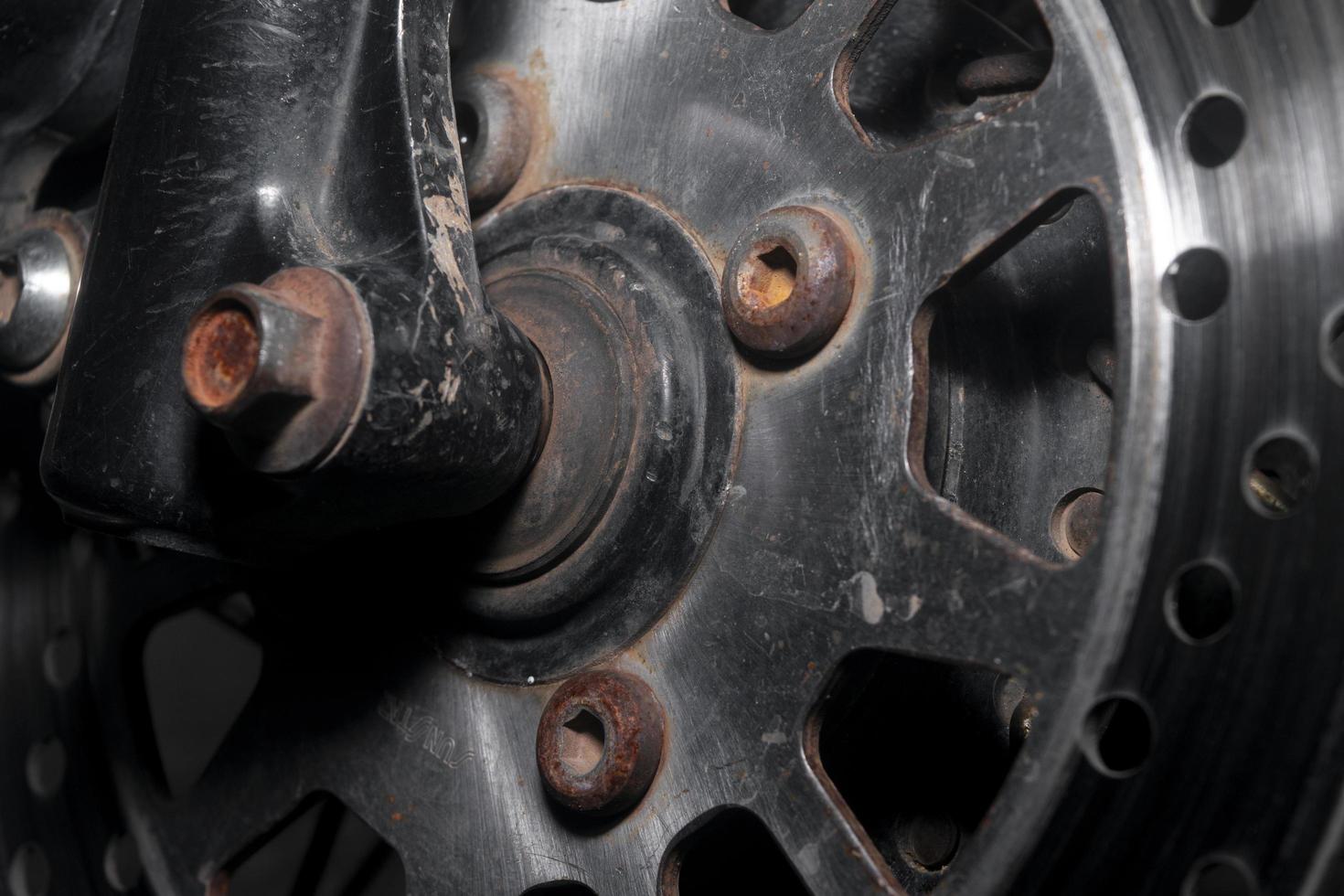 old disk brake of motorcycle photo