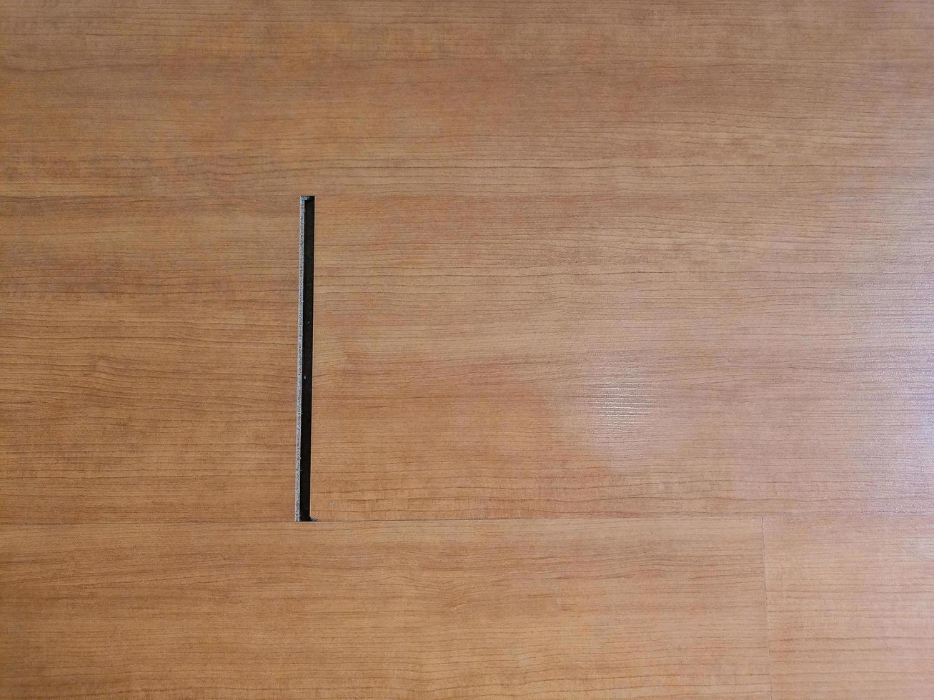 Parquet or laminate flooring in rooms with floors damaged from moisture or water. photo