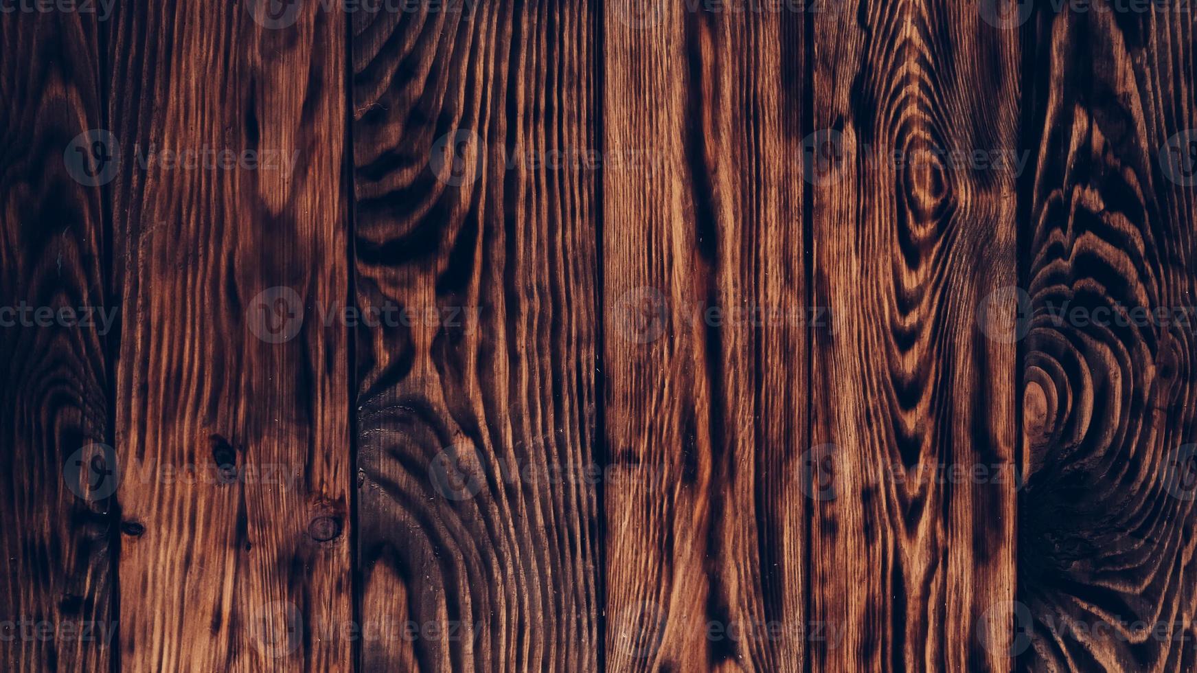 Brown wooden boards as a background texture photo