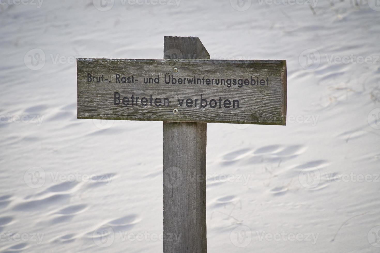 Sign, bathing prohibited, trespassing prohibited, in the national park, on the Darss. photo