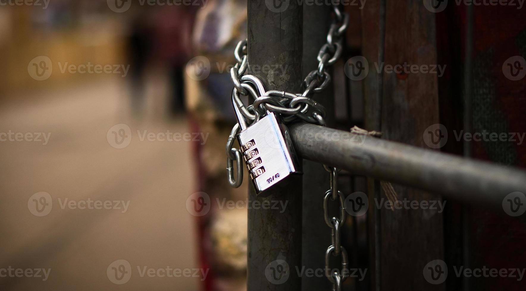 Padlock on a chain. Locked and locked. mysterious and safe. Detail photo