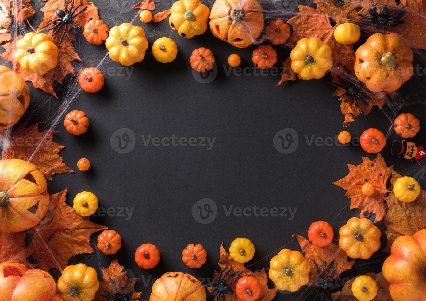 Halloween decoration on black background top view with copy space photo