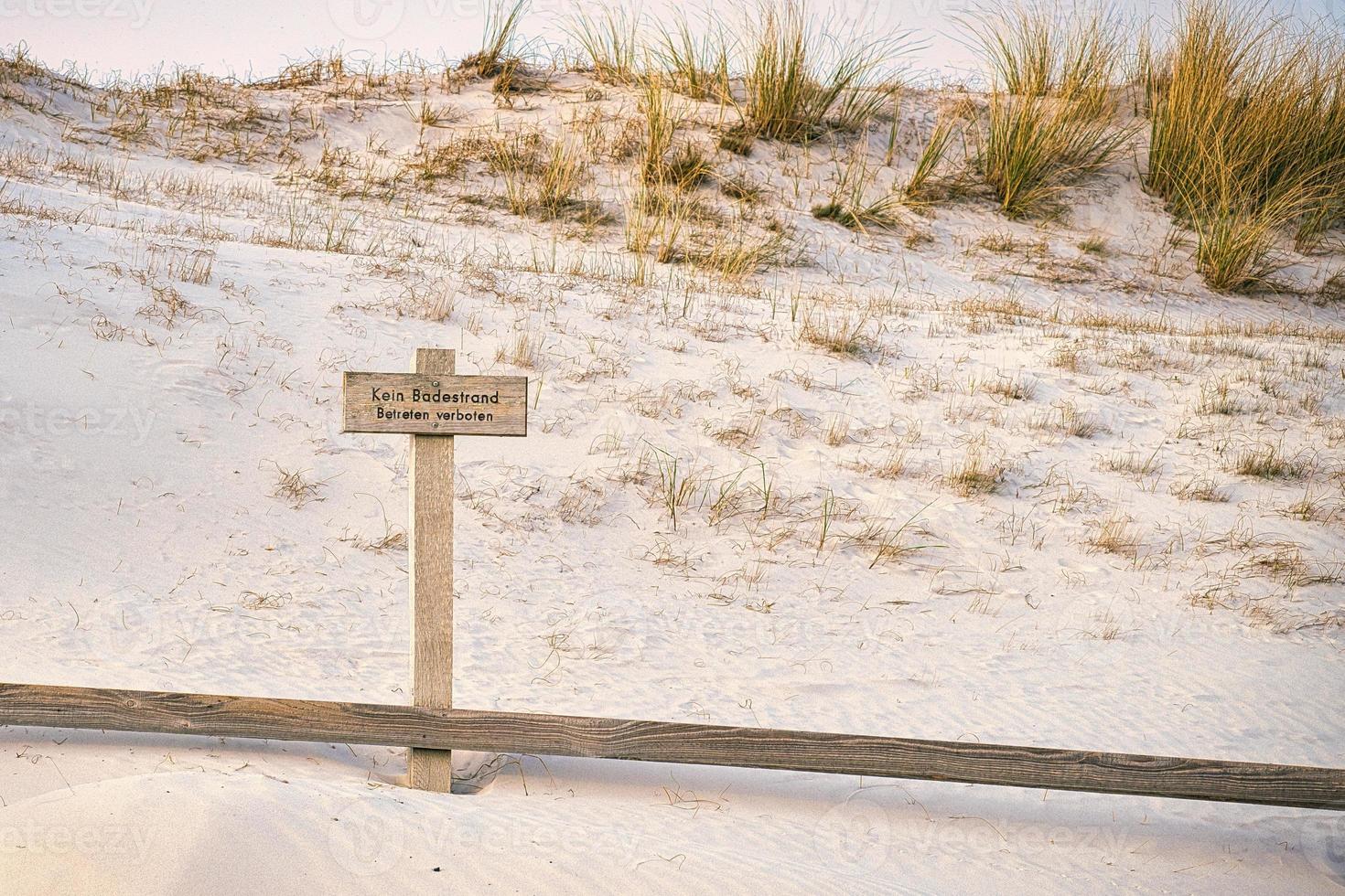 Sign, bathing prohibited, trespassing prohibited, in the national park, on the Darss. photo