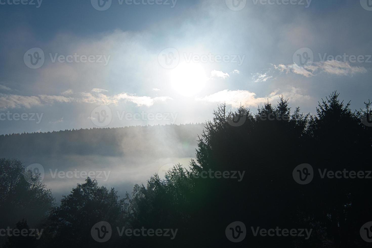 sunrise with fog in the early morning hours. mystical atmosphere photo