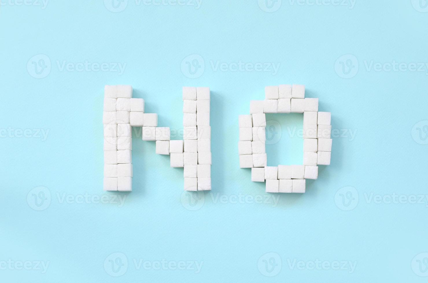 Refusing sugar sign with big letters on blue background photo