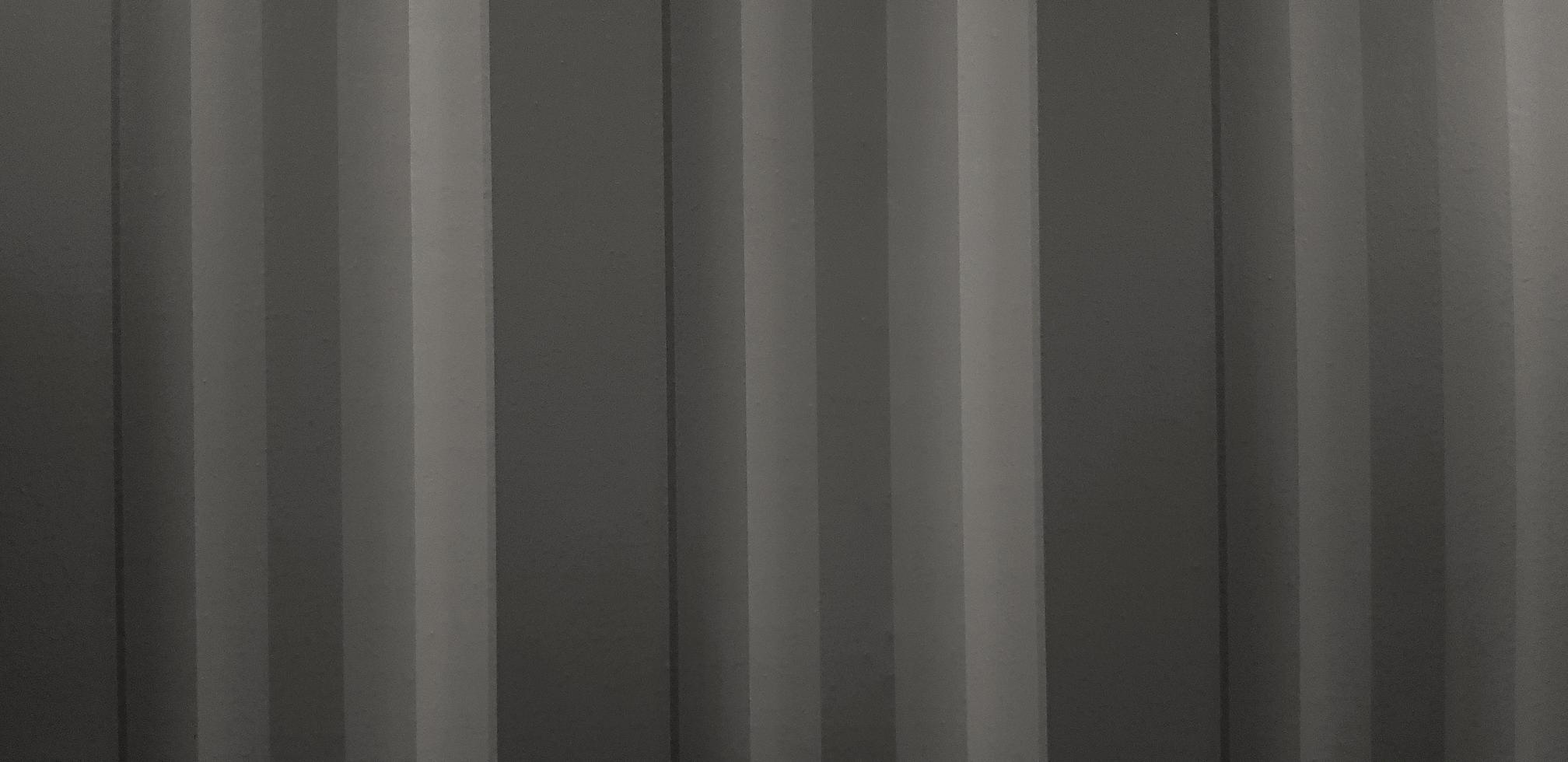 Line pattern of Dark gray background. Grey wallpaper or wall. photo