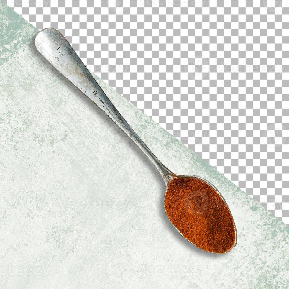 Teaspoon of stainless steel with brown sugar, isolated on transparency photo