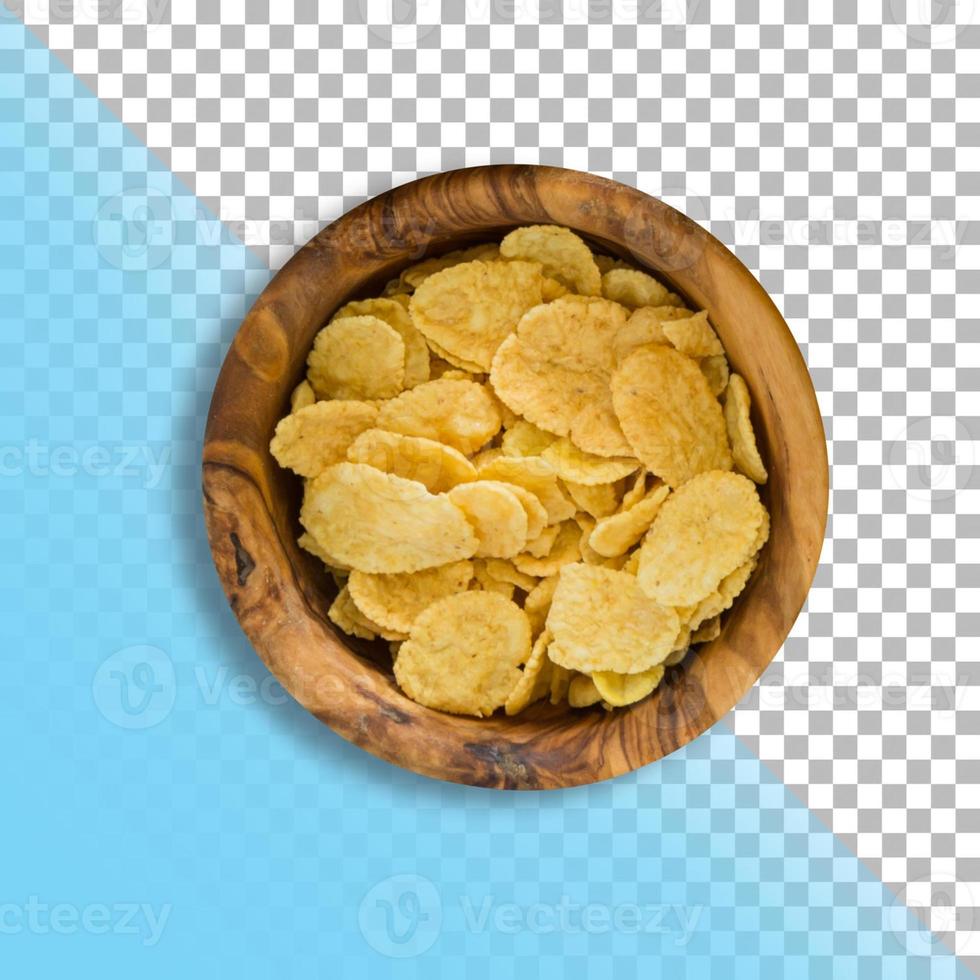 Closeup view corn flakes on wooden bowl over transparent background. photo