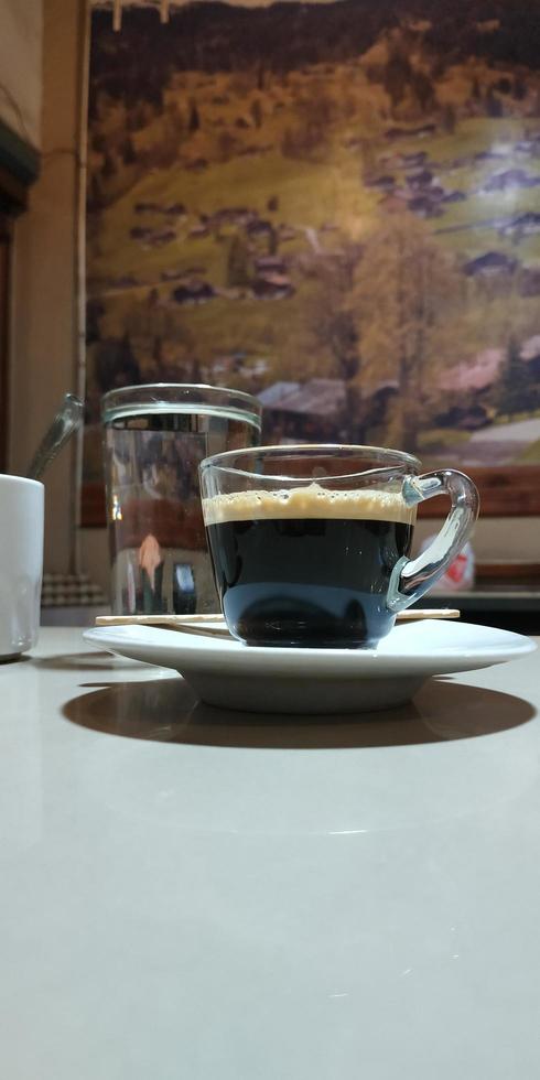 espresso coffee with a small glass photo