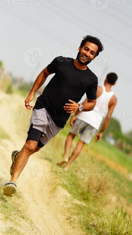 rural man is running at street photo