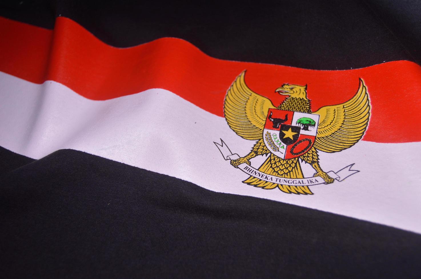 Gresik, indonesia, 2022 - garuda logo and red and white on cloth photo