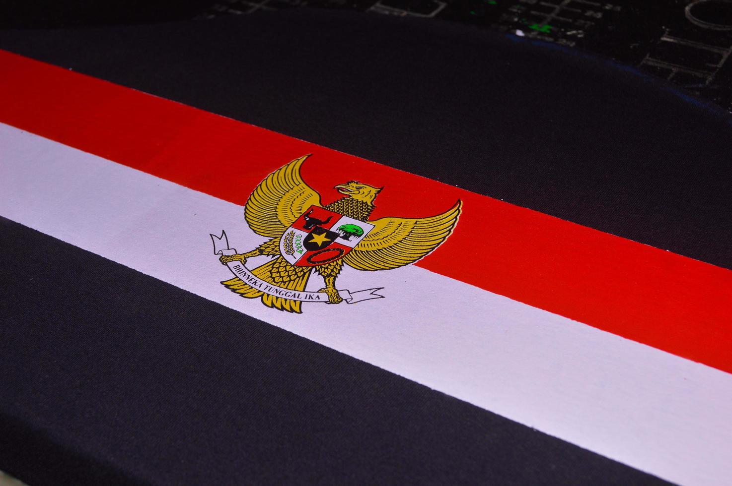 Gresik, indonesia, 2022 - garuda logo and red and white on cloth photo