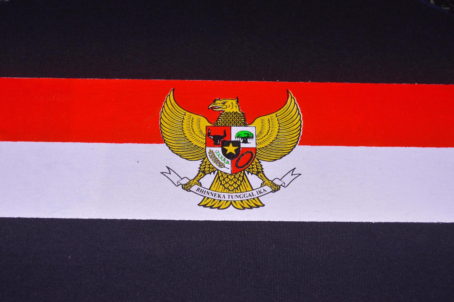 Gresik, indonesia, 2022 - garuda logo and red and white on cloth photo