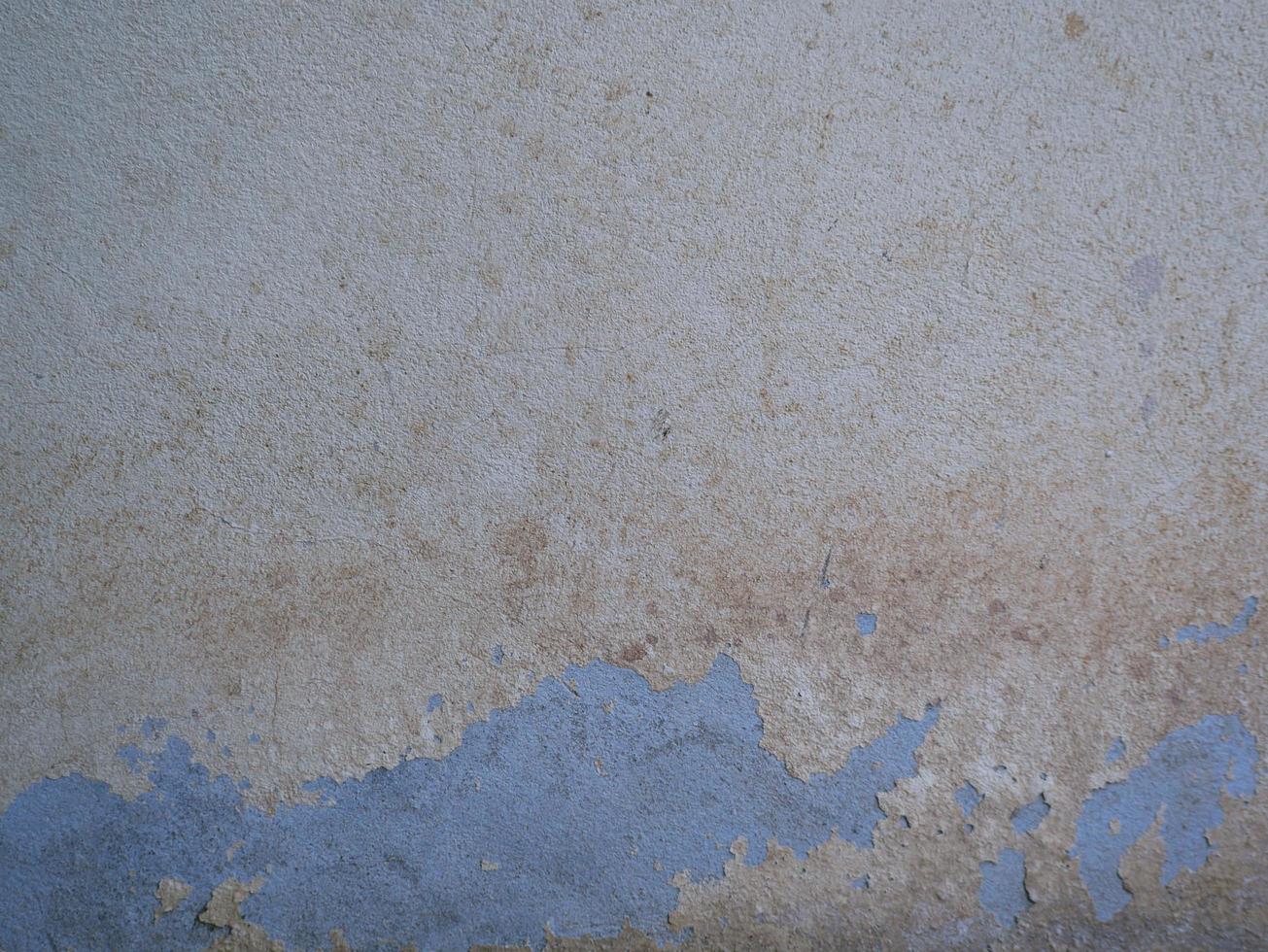 Old cement or concrete outdoor wall with stains and moldy for background. photo